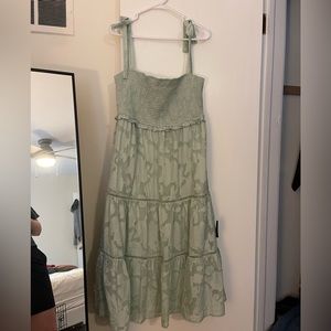 New with tags green Lulu’s dress, XL. Smocking and adjustable straps.